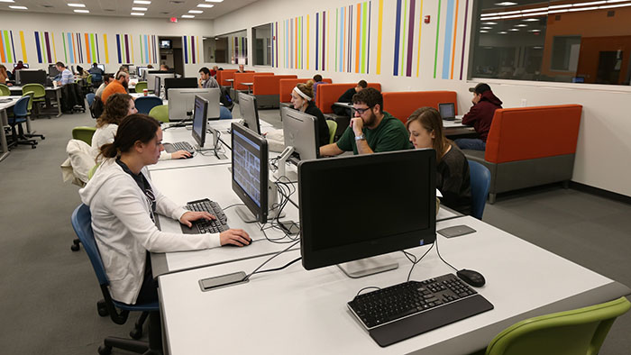 Students working in a computer lab in Glass Hall.
