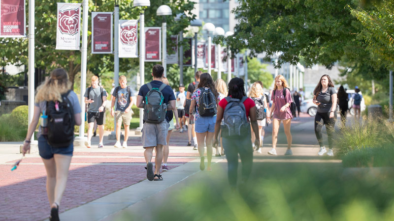Students walking on the Missouri State University campus.