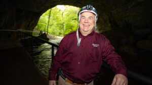 Doug Gouzie in a cave