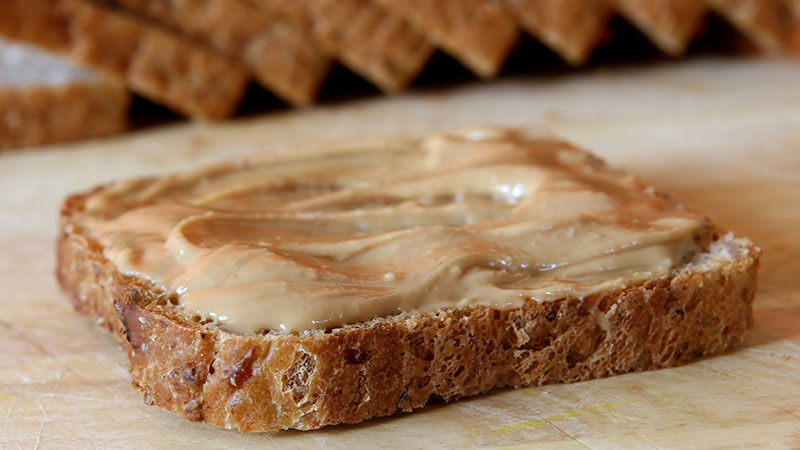A slice of peanut butter toast.