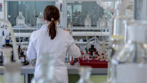 A female chemist working in a laboratory.