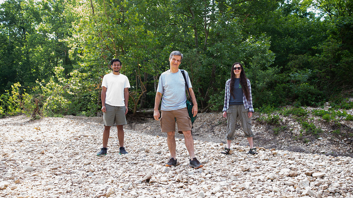 Graduate student Sujan Thapa (left) and Dr. Courtney Coleman (right) accompany Dr. Laszlo Kovacs on a trip to Swan Creek.