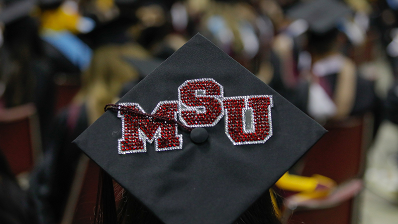 A mortarboard with "MSU" on it.