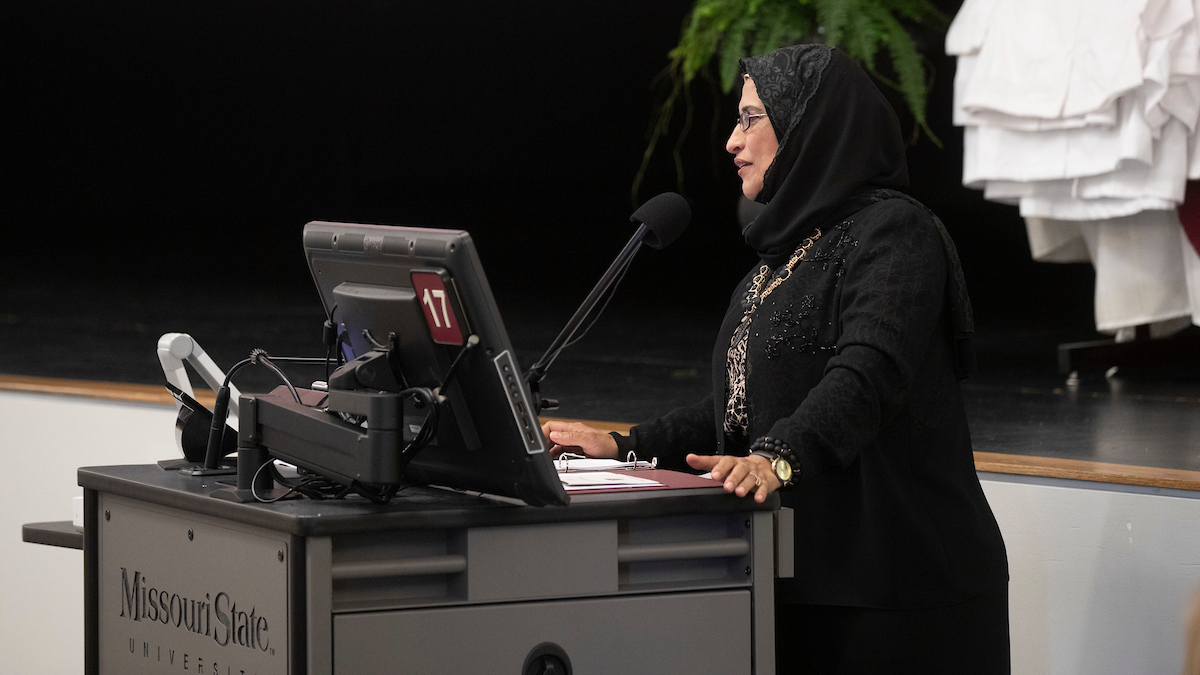Wafaa Kaf presents at the 2019 white coat ceremony.