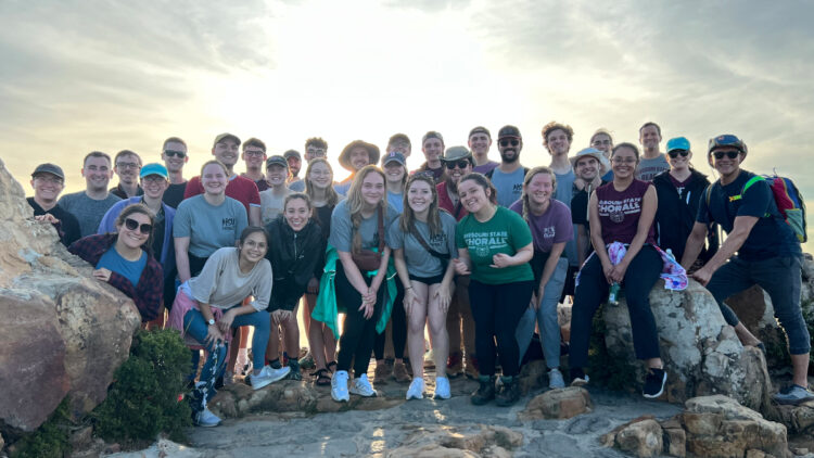 Chorale poses in South Africa.