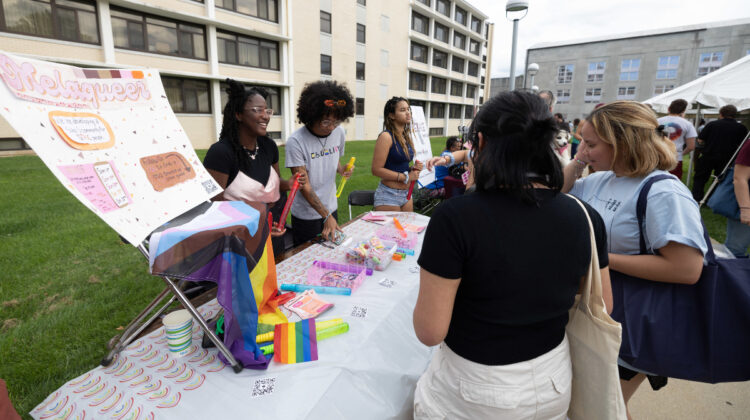 Students gather at Meloqueer table at Missouri State's Belon-B-Q.