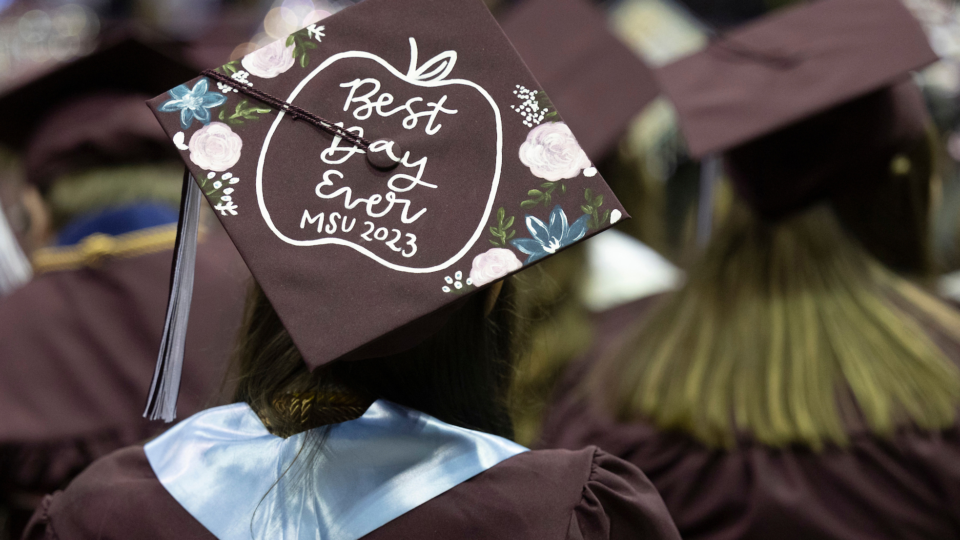 A graduate's mortarboard with the words "Best Day Ever MSU 2023" on it.