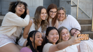 A group of female students posing for a selfie.