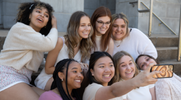 A group of female students posing for a selfie.