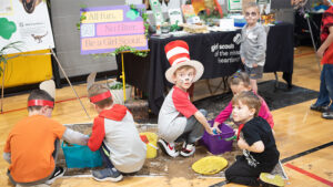 A group of children wearing Cat in the Hat costumes