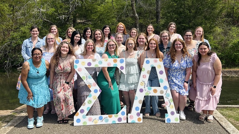 A photo of members of the Alpha Xi sorority.