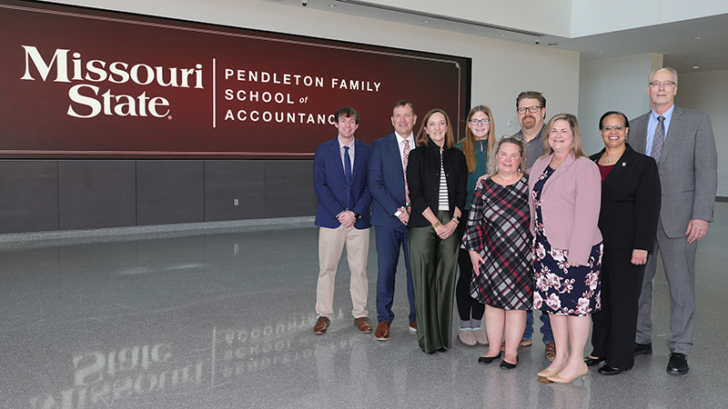 Members of the Pendleton family with Missouri State University representatives.